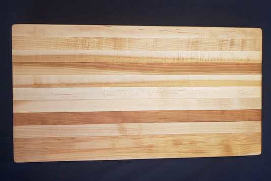 8.75"X16.5"X1.75" Edge Grain Hard Maple and Cherry Cutting Block